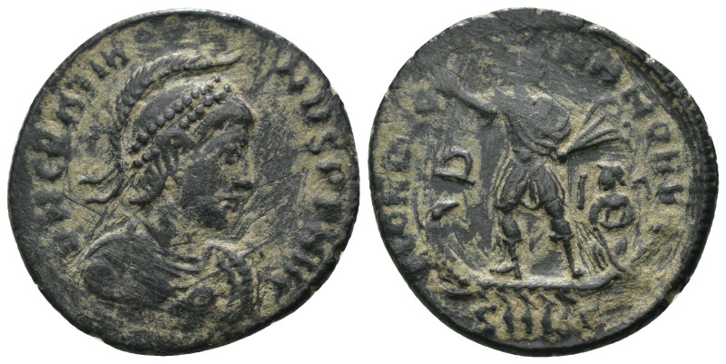 Gratian. (392-395 AD). Follis. Constantinople. Obv: D N GRATIANVS P F AVG. helme...