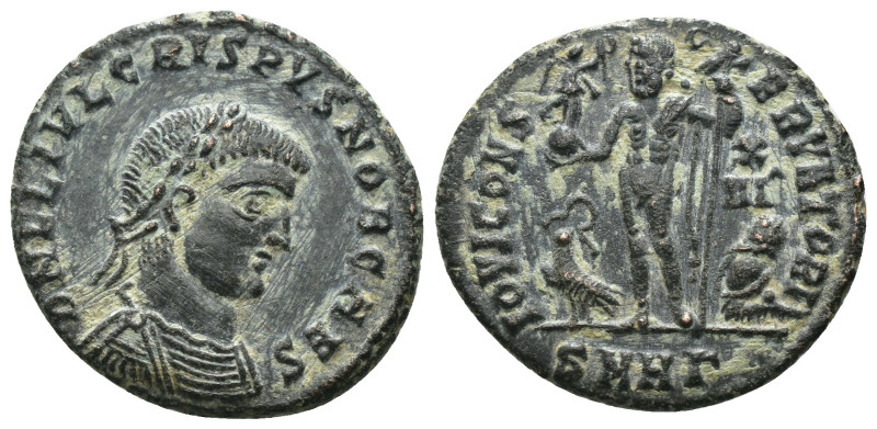 Crispus. (317 AD). Follis. Heraclea. Obv: FL IVL CRISPVS NOB CAES. laureate bust...