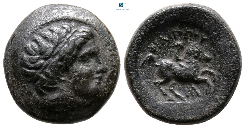 Kings of Macedon. Uncertain mint. Philip II of Macedon 359-336 BC. 
Bronze Æ
...