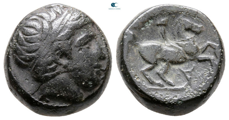 Kings of Macedon. Uncertain mint. Philip II of Macedon 359-336 BC. 
Bronze Æ
...
