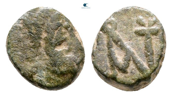 Anastasius I AD 491-518. Uncertain mint
Nummus Æ

7 mm, 0,51 g



Very Fi...