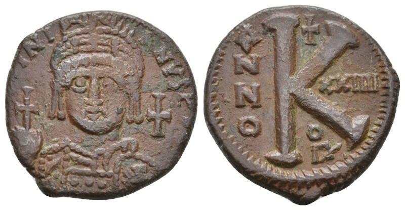 JUSTINIAN I (527-565). Follis.
.
Condition: Very Fine.
Weight: 9 g.
Diameter: 25...