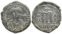 MAURICE TIBERIUS (582-602). Follis. 
.
Condition: Very Fine.
Weight: 11.99 g.
Diameter: 31.3 mm