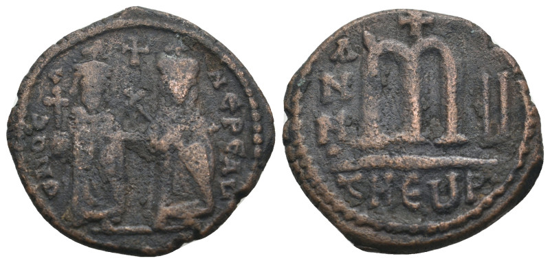 PHOCAS with LEONTIA (602-610). Follis.
.
Condition: Fine.
Weight: 8.85 g.
Diamet...