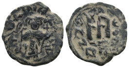 Islamic. Arab-Byzantine (?) 660-680 AD. Ae.
.
Condition: Very Fine.
Weight: 5.11 g.
Diameter: 23.5 mm
