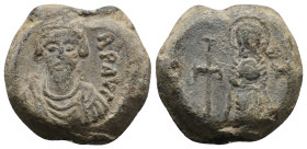 BYZANTINE LEAD SEALS. Phocas (Emperor, 602-610). 
.
Condition: Very Fine.
Weight: 16.93 g.
Diameter: 22.2 mm
