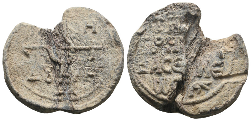 BYZANTINE LEAD SEALS. Uncertain.
.
Condition: Fine.
Weight: 21.06 g.
Diameter: 3...