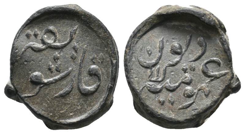 ISLAMIC LEAD SEALS or BULLA.
.
Condition: Very Fine.
Weight: 10.31 g.
Diameter: ...