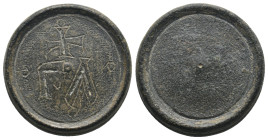 COMMERCIAL WEIGHT (Circa 4th-6th centuries). 
.
Condition: Very Fine.
Weight: 26.58 g.
Diameter: 25.7 mm