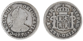 Moneda virreinal. Carlos III. ½ Real. 1776. J.R (José de Vargas y Flor y Raimundo de Yturriaga). Potosí. Anv: Busto de Carlos III mirando hacia la der...
