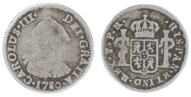 Moneda virreinal. Carlos III. ½ Real. 1780. P.R (Pedro de Mazondo y Raimundo de Yturriaga). Potosí. Anv: Busto de Carlos III mirando hacia la derecha;...