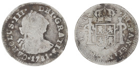 Moneda virreinal. Carlos III. ½ Real. 1781. P.R (Pedro de Mazondo y Raimundo de Yturriaga). Potosí. Anv: Busto de Carlos III mirando hacia la derecha;...