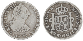 Moneda virreinal. Carlos III. 1 Real. 1783. P.R (Pedro de Mazondo y Raimundo de Yturriaga). Potosí. Anv: Busto de Carlos III mirando hacia la derecha;...