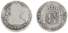 Moneda virreinal. Carlos III. 2 Reales. 1775. J.R (José de Vargas y Flor y Raimundo de Yturriaga). Potosí. Anv: Busto de Carlos III mirando hacia la d...