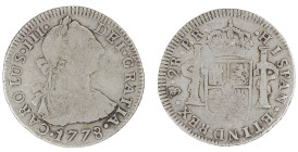 Moneda virreinal. Carlos III. 2 Reales. 1778. P.R (Pedro de Mazondo y Raimundo de Yturriaga). Potosí. Anv: Busto de Carlos III mirando hacia la derech...