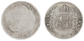 Moneda virreinal. Carlos III. 2 Reales. 1780. P.R (Pedro de Mazondo y Raimundo de Yturriaga). Potosí. Anv: Busto de Carlos III mirando hacia la derech...