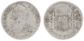 Moneda virreinal. Carlos III. 2 Reales. 1782. P.R (Pedro de Mazondo y Raimundo de Yturriaga). Potosí. Anv: Busto de Carlos III mirando hacia la derech...