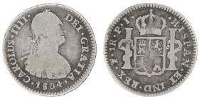 Moneda virreinal. Carlos IV. 1 Real. 1804. P.J (Pedro Martin de Albizu y Juan Palomo Sierra). Potosí. Anv: Busto de Carlos IV mirando hacia la derecha...