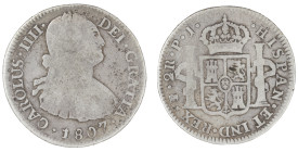 Moneda virreinal. Carlos IV. 2 Reales. 1807. P.J (Pedro Martin de Albizu y Juan Palomo Sierra). Potosí. Anv: Busto de Carlos IV mirando hacia la derec...