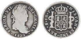 Moneda virreinal. Fernando VII. 1 Real. 1821. P.J (Pedro Martin de Albizu y Juan Palomo Sierra). Potosí. Anv: Busto de Fernando VII mirando hacia la d...