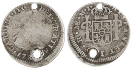 Moneda virreinal. Carlos III. ½ Real. 178X. M.I (Manuel Iglesia Abarca e Ignacio Zenón Gálvez) . Lima. Anv: Busto de Carlos III mirando hacia la derec...