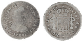 Moneda virreinal. Carlos III. ½ Real. 1779. M.J (Manuel Iglesia Abarca y Juan José Cano Melgarejo) . Lima. Anv: Busto de Carlos III mirando hacia la d...