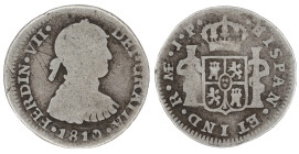 Moneda virreinal. Fernando VII. ½ Real. 1810. J.P (Juan Martínez de Rosas y Pablo Cano Melgarejo). Lima. Anv: Busto imaginario de Fernando VII mirando...
