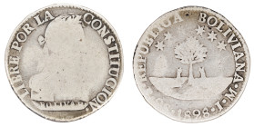 Moneda Republicana. Bolivia. 2 Soles. 1828. J.M. Potosí. Anv: Busto del Libertador Simón Bolívar mirando hacia la derecha; BOLIVAR / LIBRE POR LA / CO...
