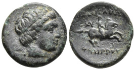 Kingdom of Macedon. Philip II Æ 1/4 Unit. Miletos c. 323. Male head r., wearing tainia / Youth on horseback r.; monogram above. SNG ANS 1005. 1.14g, 1...