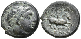 Kingdom of Macedon. Philip II Æ 1/4 Unit. Miletos c. 323. Male head r., wearing tainia / Youth on horseback r.; monogram above. SNG ANS 1005. 4,37g, 1...