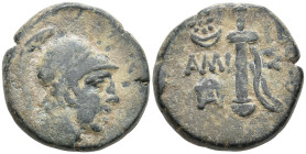 Pontos, Amisos Æ 21mm. Circa 85-65 BC. Young male head to right, wearing crested helmet / Sword in sheath; eight-rayed star above crescent to upper le...