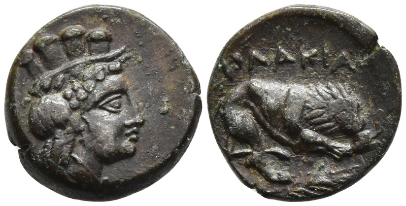 Mysia, Plakia Æ12. 4th century BC. Head of Kybele right / ΠΛΑΚΙΑ, Lion standing ...