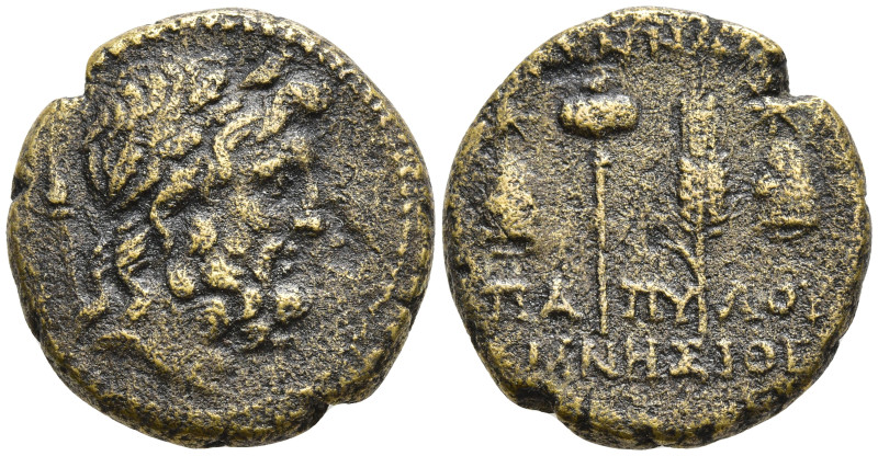 Phrygia, Synnada Æ19. after 133. Laureate head of Zeus r. / Poppy and grain ear ...