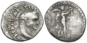 Cappadocia, Caesarea. Vespasian AR Hemidrachm . AD 69-79. Laureate head right / Nike advancing right, holding wreath and palm. Metcalf 17; Sydenham 94...