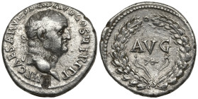 Vespasian AR Denarius. Ephesus, AD 70. IMP CAESAR VESPAS AVG COS II TR P P P, laureate head right / AVG above horizontal monogram; all within oak wrea...