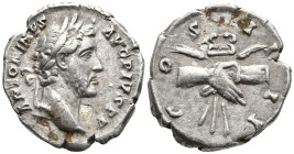 Antoninus Pius AR Denarius. Rome, AD 145-147. ANTONINVS AVG PIVS P P, laureate head right / COS IIII, clasped right hands holding caduceus between two...