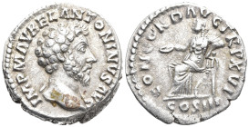 Marcus Aurelius AR Denarius. Rome, AD 161-162. IMP M AVREL ANTONINVS AVG, laureate head right / CONCORD AVG TR P XVI, Concordia seated left, holding p...