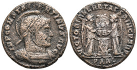 Constantine I Æ follis, AD 307/10-337. Arles mint, struck 319 AD. IMP CONSTANTINVS MAX AVG, laureate, helmeted, and cuirassed bust right / VICTORIAE L...