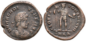Arcadius. Æ AD 383-408. Cyzicus mint. Struck AD 392-395. Pearl-diademed, draped, and cuirassed bust right / Arcadius standing facing, holding standard...