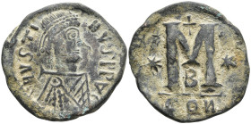 Justin I Æ 40 Nummi. Constantinople, AD 518-527. D N IVSTINVS P P AVG, diademed, draped and cuirassed bust to right / Large M; star to left and right,...