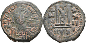 Justinian I Æ 40 Nummi. Cyzicus, dated RY 14 = AD 540/1. D N IVSTINIANVS P P AVG, helmeted and cuirassed bust facing, holding globus cruciger and shie...