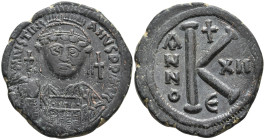 Justinian I Æ 20 Nummi. Constantinopolis, year 12 = AD 538/539. Facing bust / Large K, officina Δ. MIBE 96; Sear 165. 14.52g, 30,5mm, 6h. Very Fine, b...