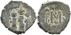 Heraclius, with Martina and Heraclius Constantine, Æ Nummus. Constantinople, dated RY 15(?) = AD 624/5. Martina, Heraclius, and Heraclius Constantine ...