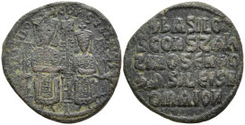 Basil I the Macedonian, with Constantine. 867-886. Æ Follis Constantinople mint. Struck 868-870. Crowned figures of Basil and Constantine enthroned fa...
