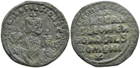 Basil I the Macedonian, with Constantine and Leo VI. 867-886. Æ Follis. Constantinople mint. Struck 870-879. Crowned half-length figures of Basil, wea...