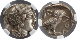 Greek Coins
Attica, Athens. Tetradrachm after 449, AR. Head of Athena r., wearing Attic helmet decorated with olive leaves and palmette. Rev. AΘE Owl ...