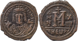 The Byzantine Empire
Maurice Tiberius, 582-602. AE Follis 11.77 g, Theoupolis (Antiochia), RY 14 = 596/597. δ N mAЧΓI CN P AЧT Bust of Maurice Tiberiu...