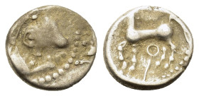 Central Gaul, Bituriges Cubi, c. 1st century BC. AR Quinarius (12,2mm, 1.9g). Bare male head l. R/ Horse prancing l.; sword above; symbol below. D&T 3...