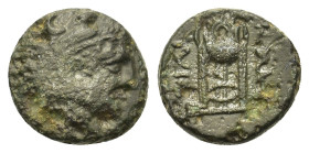 Macedon, Philippi, c. 356-345. Æ (10mm, 1.40g). Head of young Herakles right, wearing lion skin. R/ ΦΙΛΙ ΠΠΩΝ Tripod. Cf. SNG ANS 668-671.  VF. and ex...