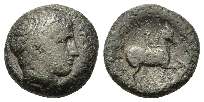Kings of Macedon. Philip II (359-336 BC). Æ (18,3mm, 7g). Diademed head of Apoll...